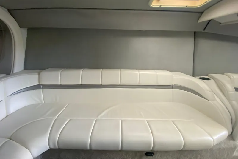 Slide: The Image of 2006 Formula 353 FASTech interior with white leather seating and modern design. - 18