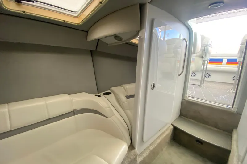 Slide: The Image of Interior of 2006 Formula 353 FASTech boat with beige seating and modern design. - 19