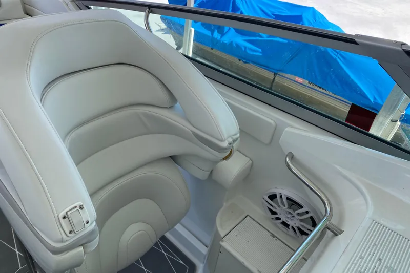 Slide: The Image of 2006 Formula 353 FASTech boat interior with white seating and speaker detail. - 31