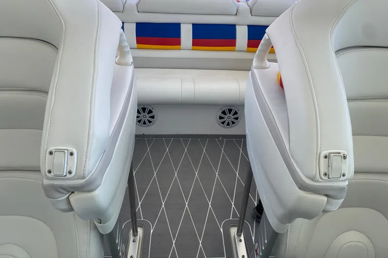 Slide: The Image of 2006 Formula 353 FASTech boat interior with white leather seats and colorful accents. - 34