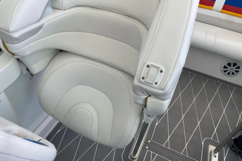 Slide: The Image of 2006 Formula 353 FASTech boat interior with white leather seating and modern design. - 35