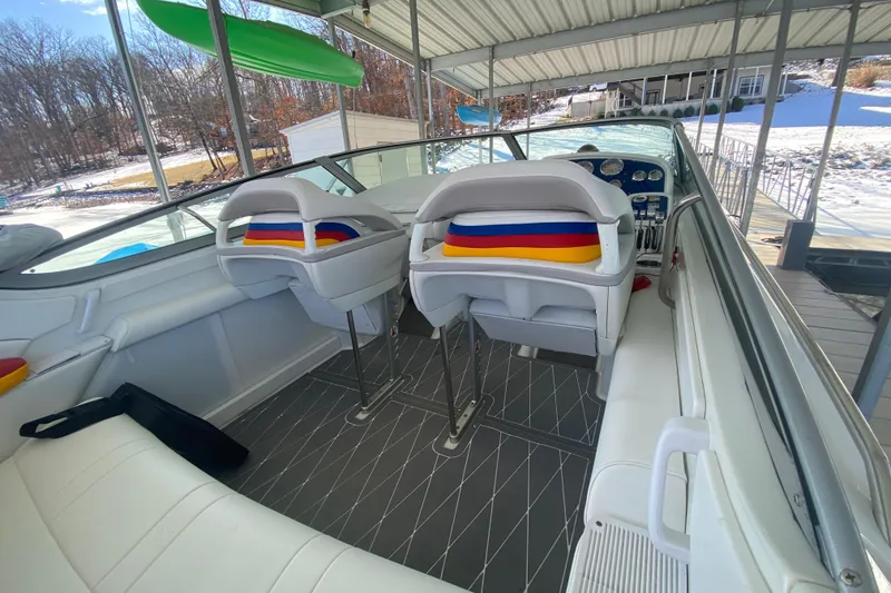 Slide: The Image of 2006 Formula 353 FASTech boat interior with white seating and colorful accents. - 7