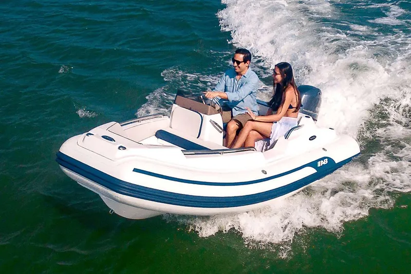 The Image of Manufacturer Provided Image: 2026 AB Inflatables Nautilus 13 DLX on water with two people. - 0