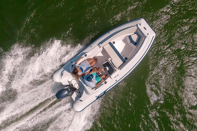 Slide: The Image of Manufacturer Provided Image: Aerial view of AB Inflatables Nautilus 14 DLX boat on water. - 4