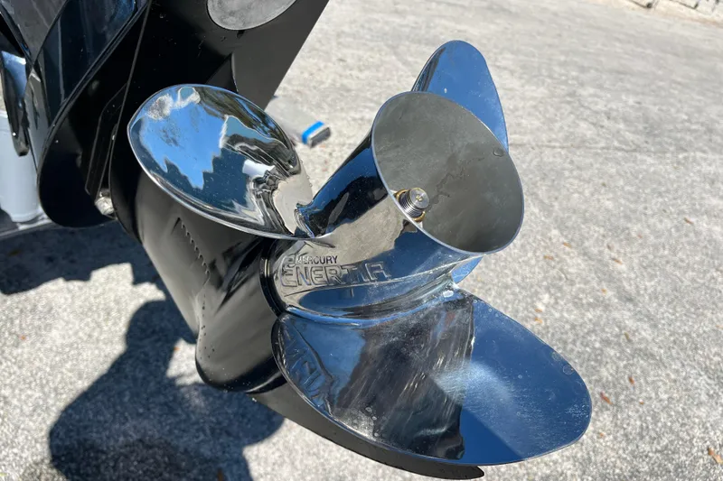 Slide: The Image of Close-up of a 2024 Harris Cruiser 230 boat propeller in sunlight. - 25
