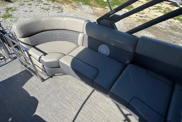 Slide: The Image of 2024 Barletta CORSA 25 QSSA pontoon boat seating area with modern gray upholstery. - 19