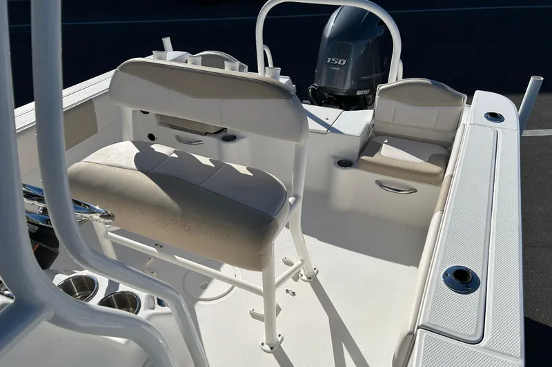 Slide: The Image of 2016 Robalo R200 Center Console boat interior with seating and Yamaha 150 engine. - 11