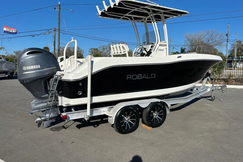 Slide: The Image of 2016 Robalo R200 Center Console boat on trailer with Yamaha engine. - 2
