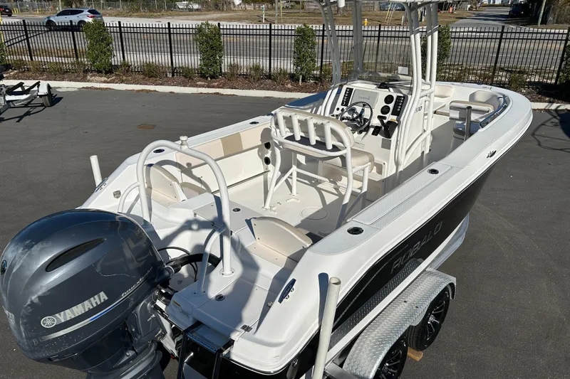 Slide: The Image of 2016 Robalo R200 Center Console boat with Yamaha engine, parked on a trailer. - 7