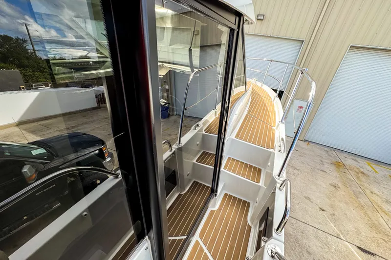 Slide: The Image of 2024 Beneteau America Antares 11 boat with sleek deck design and modern features. - 37