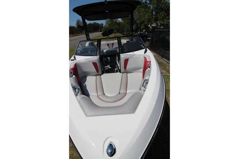 Slide: The Image of 2018 Malibu Wakesetter 20 VTX boat interior with red and gray seating. - 4