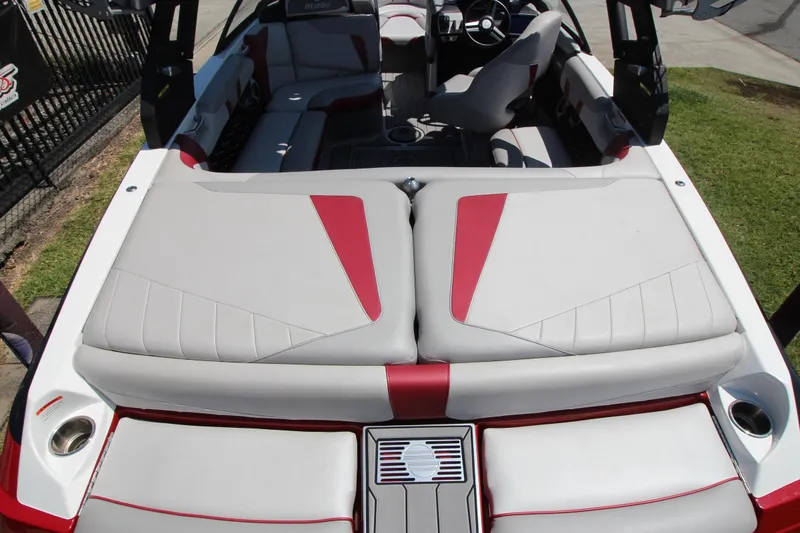 Slide: The Image of 2018 Malibu Wakesetter 20 VTX boat interior with red and gray seating. - 5