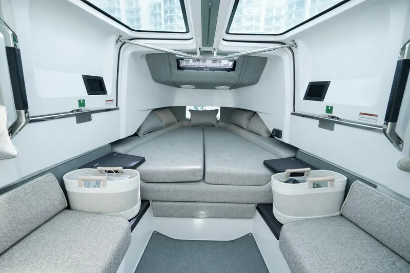 Slide: The Image of Interior of 2022 Axopar 37 XC Cross Cabin, featuring modern, comfortable sleeping area. - 15