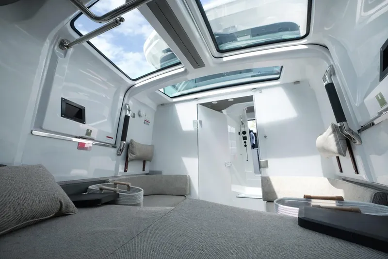 Slide: The Image of Interior of 2022 Axopar 37 XC Cross Cabin with modern design and skylight. - 16