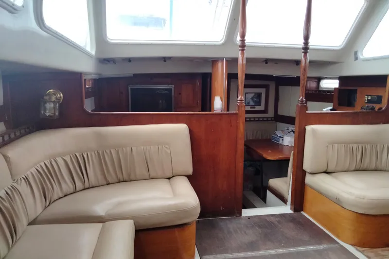 Slide: The Image of 1973 Columbia Center Cockpit interior with beige seating and wooden accents. - 8