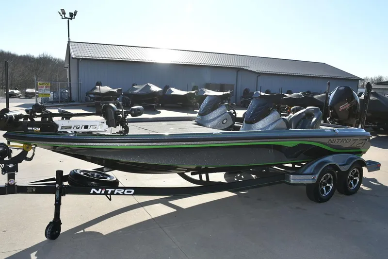 Slide: The Image of 2020 Nitro Z21 Pro fishing boat on trailer, parked outdoors. - 4
