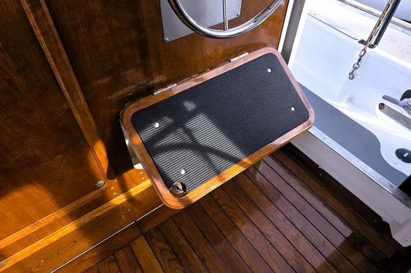 Slide: The Image of Interior of 2016 Custom 25 Tug with wooden flooring and foldable step. - 32