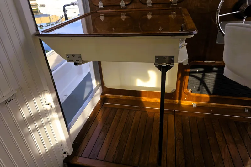 Slide: The Image of Interior of 2016 Custom 25 Tug with wooden flooring and foldable table. - 34
