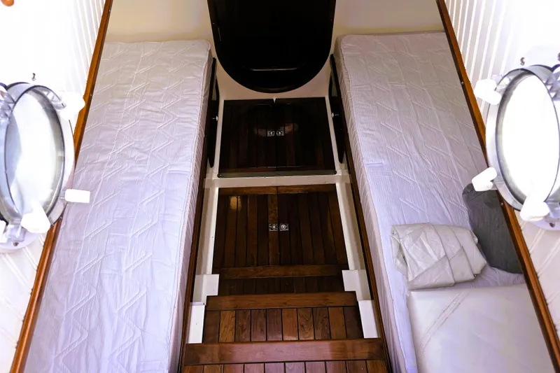 Slide: The Image of Interior of 2016 Custom 25 Tug boat with twin beds and wooden flooring. - 44