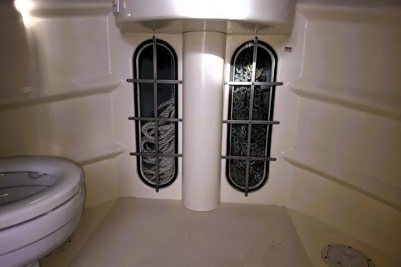 Slide: The Image of Interior of 2016 Custom 25 Tug boat with toilet and rope storage. - 49