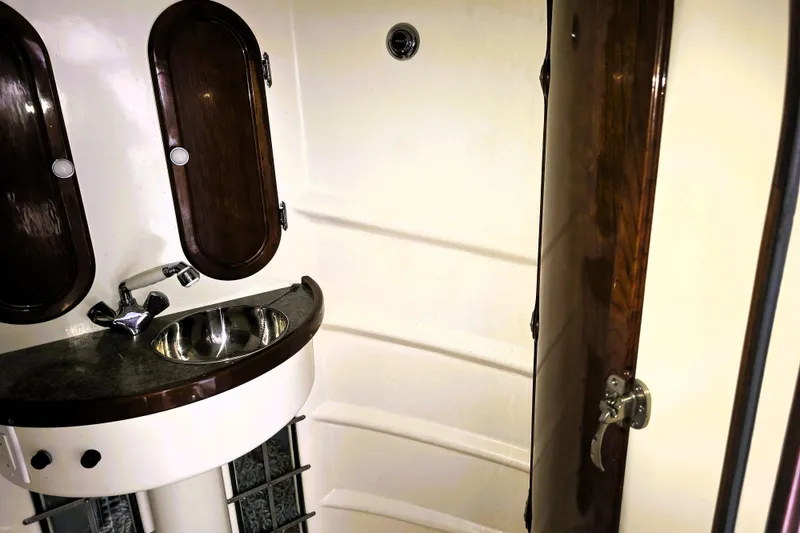 Slide: The Image of Interior of 2016 Custom 25 Tug boat with sink and wooden accents. - 51