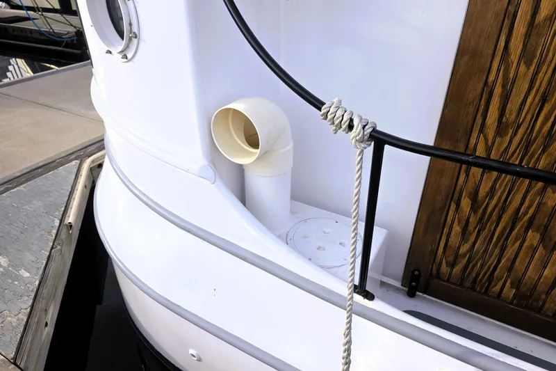 Slide: The Image of Close-up of a 2016 Custom 25 Tug boat's deck with rope and vent detail. - 6