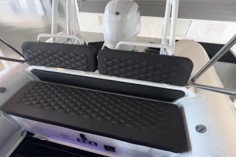 Slide: The Image of 2024 Highfield Sport 660 boat interior with quilted seating and modern design. - 5