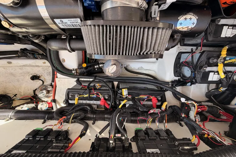 Slide: The Image of Engine compartment of 2022 Aviara AV32 I/O boat, showcasing wiring and components. - 46