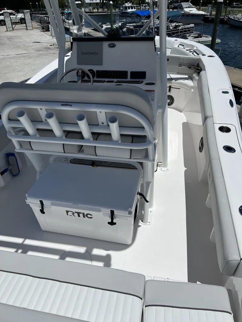 Slide: The Image of Interior view of a 2022 Sea Fox 228 Commander boat at the dock. - 22