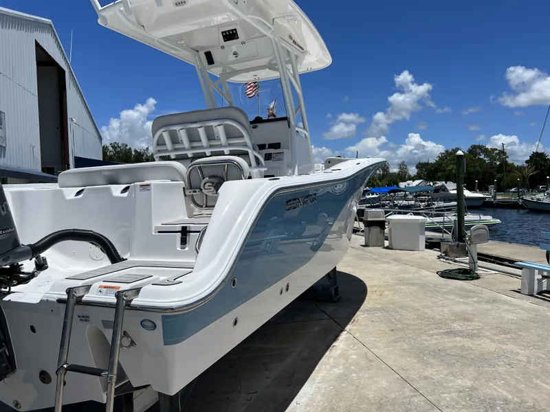 Slide: The Image of Sea Fox 228 Commander 2022 on a sunny dock. - 3