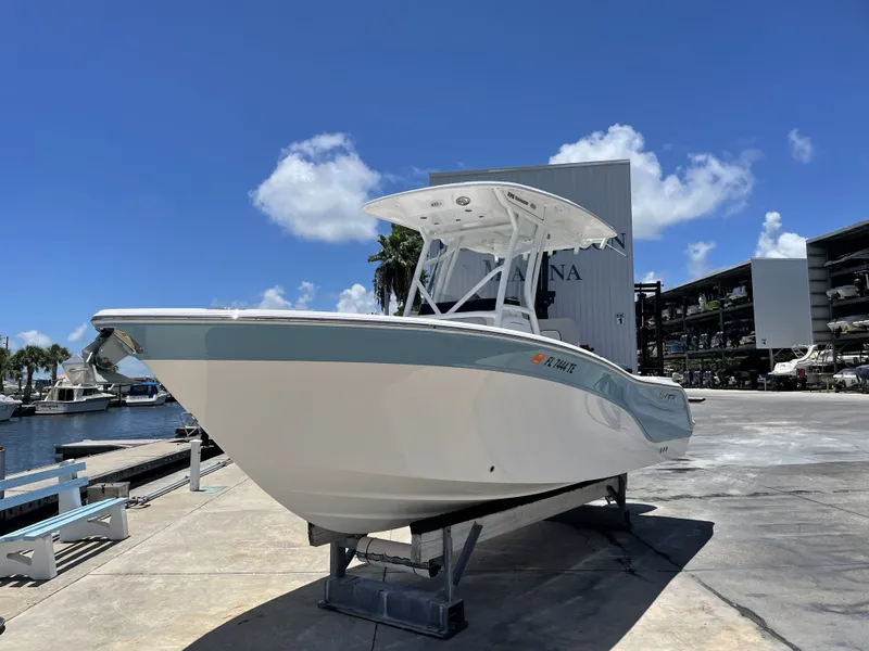 Slide: The Image of 2022 Sea Fox 228 Commander boat at marina on a sunny day. - 4