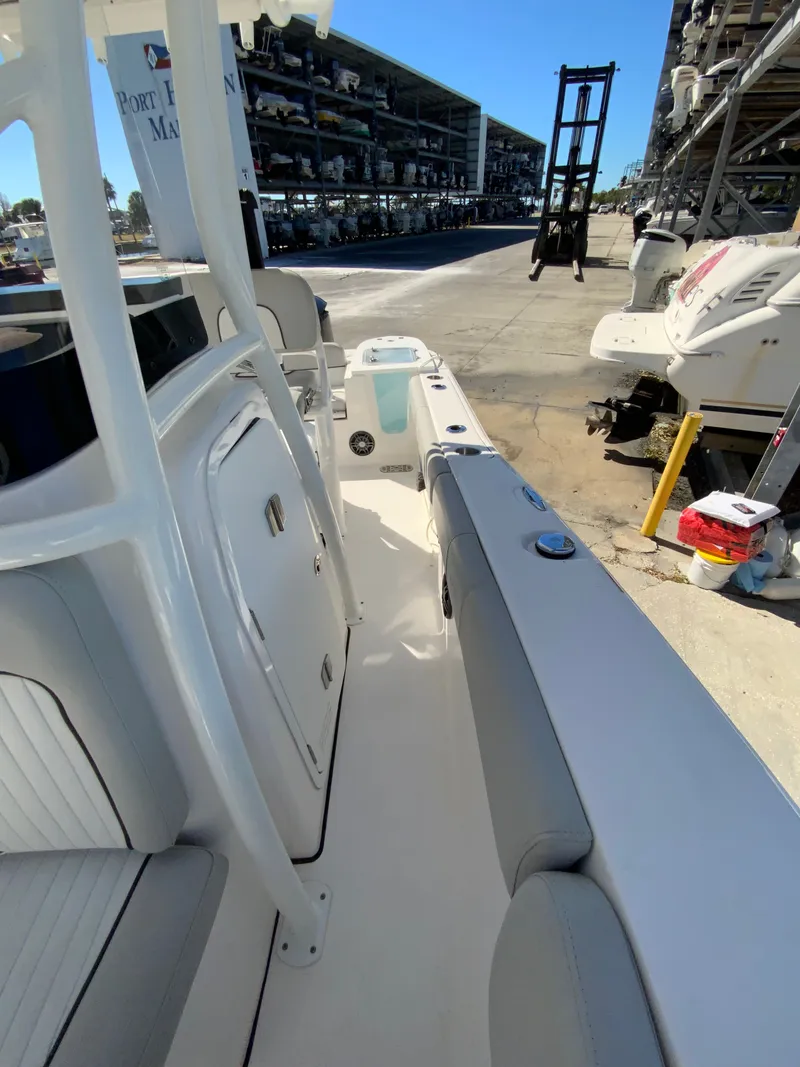 Slide: The Image of Interior view of a 2022 Sea Fox 228 Commander boat at the marina. - 49