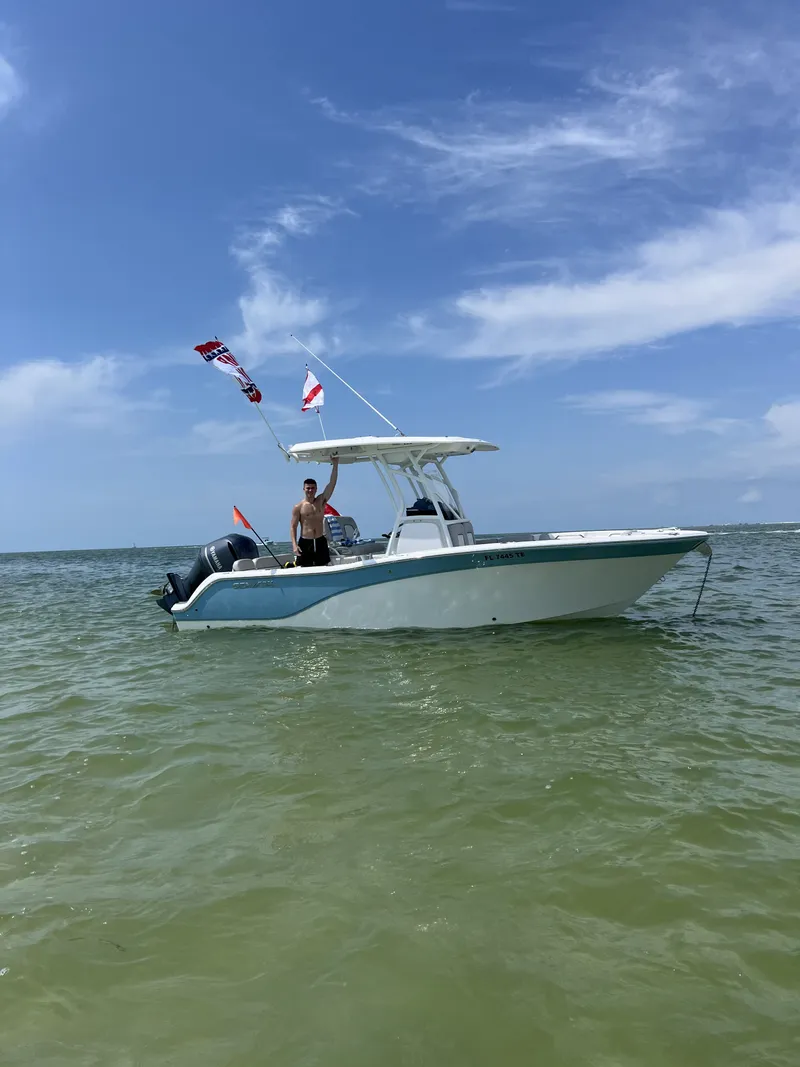 Slide: The Image of 2022 Sea Fox 228 Commander on open water under sunny skies. - 5