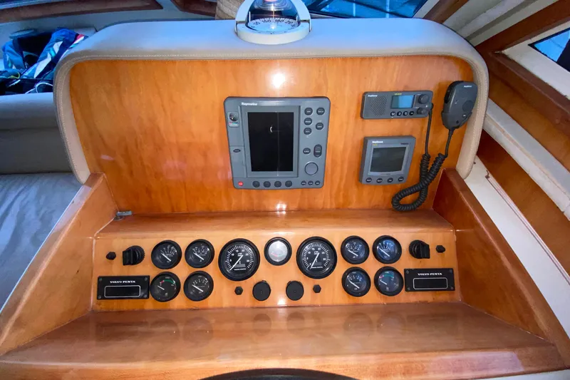Slide: The Image of 2001 Californian 39 boat dashboard with navigation instruments and gauges. - 15