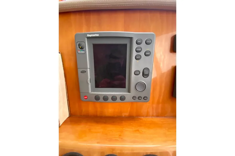 Slide: The Image of Raymarine navigation system on 2001 Californian 39 yacht dashboard. - 16