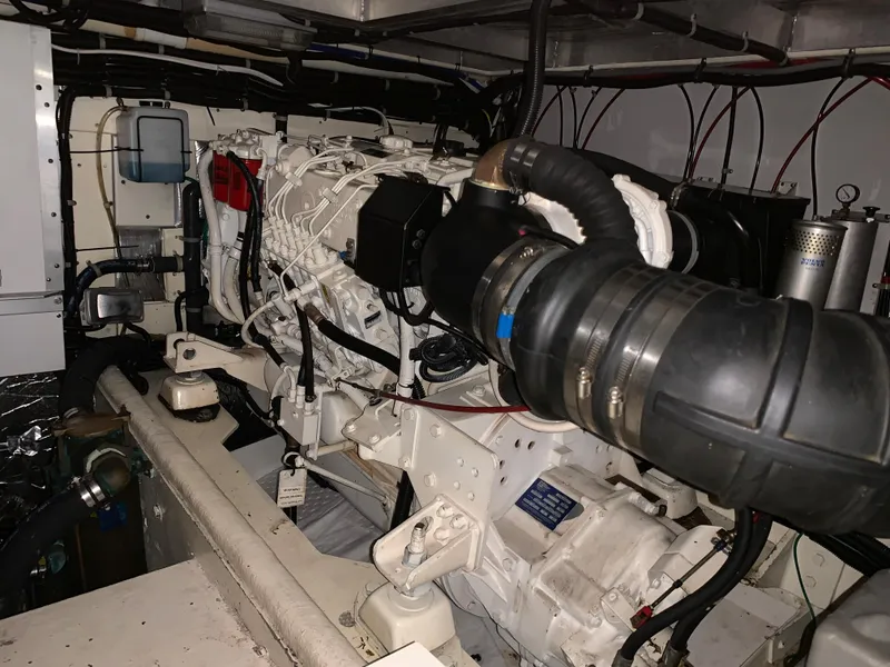 Slide: The Image of Engine room of a 2001 Californian 39 boat with complex wiring. - 23