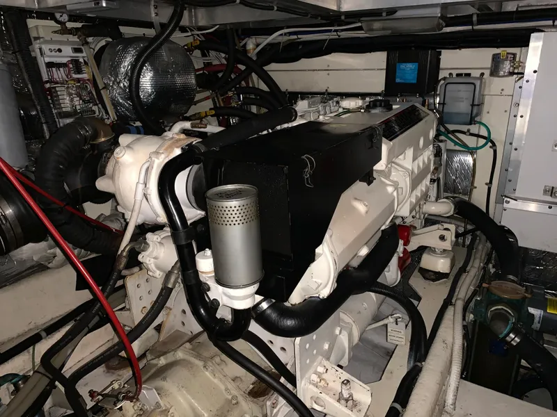 Slide: The Image of Engine room of a 2001 Californian 39 boat, showcasing complex wiring. - 24
