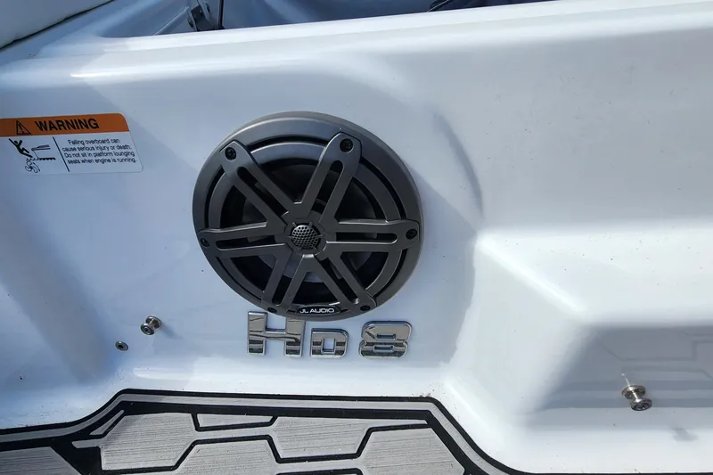 Slide: The Image of 2023 Four Winns HD8 OB boat with JL Audio speaker and warning label. - 57
