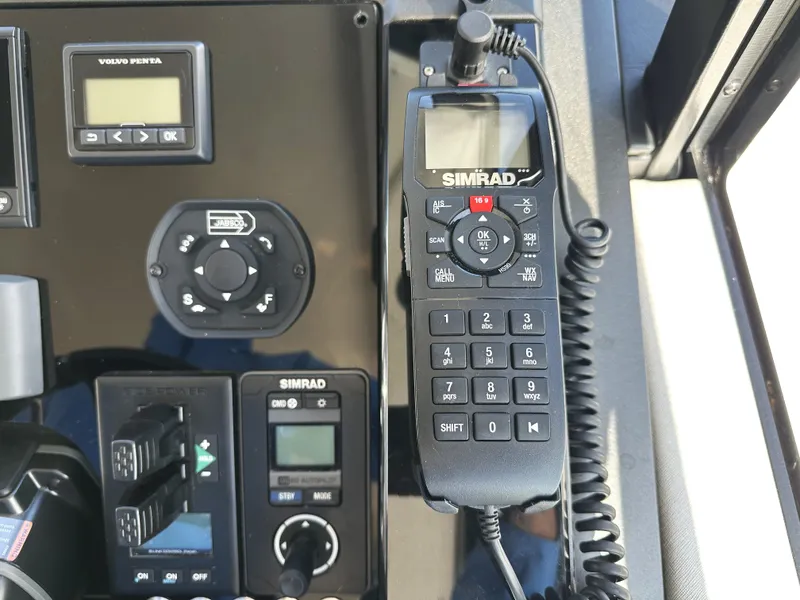 Slide: The Image of Control panel of a 2019 Sunseeker Predator 57 yacht with Simrad equipment. - 30