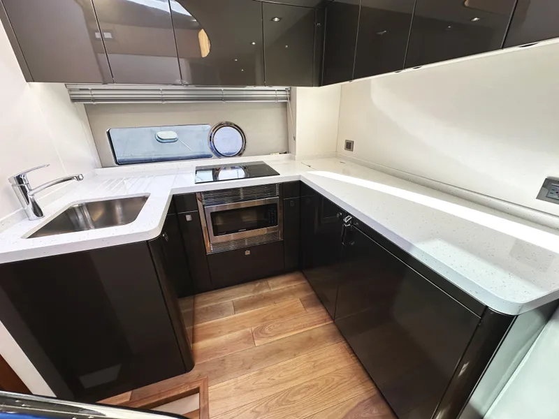 Slide: The Image of Luxurious kitchen interior of 2019 Sunseeker Predator 57 yacht with modern appliances. - 37