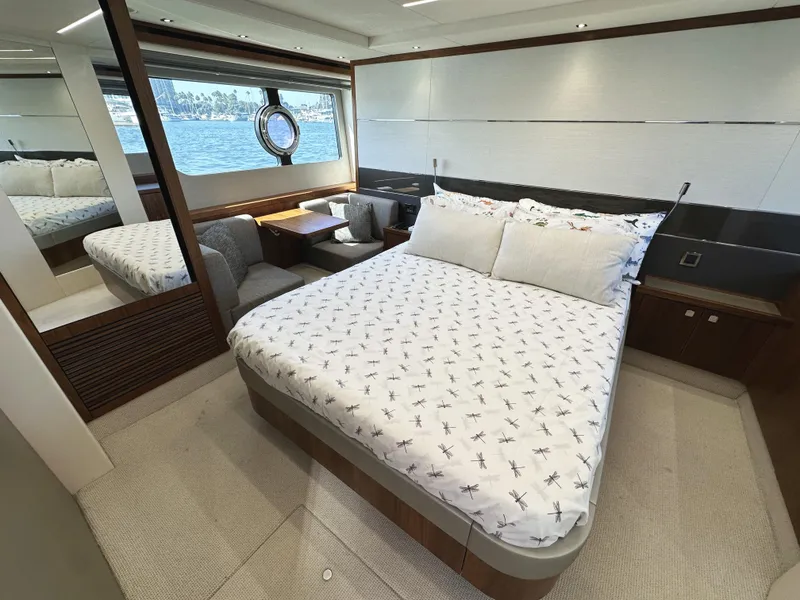 Slide: The Image of Luxurious bedroom interior of 2019 Sunseeker Predator 57 yacht with scenic window view. - 43