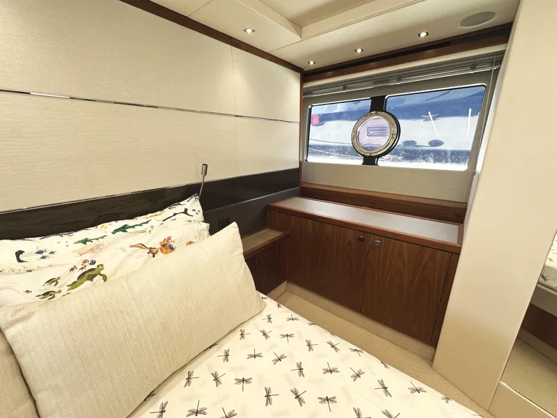 Slide: The Image of Luxurious cabin interior of 2019 Sunseeker Predator 57 yacht with elegant bedding. - 47