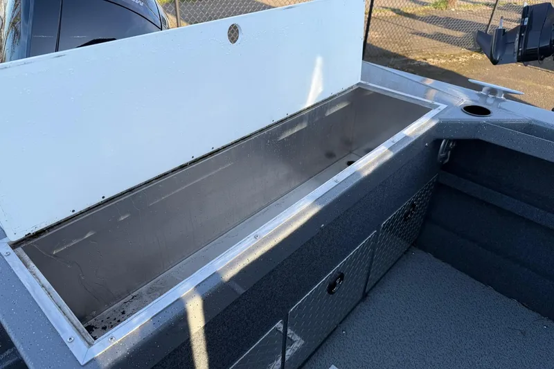 Slide: The Image of Open storage compartment in 2026 Thunder Jet 185 Luxor boat, featuring durable interior design. - 37