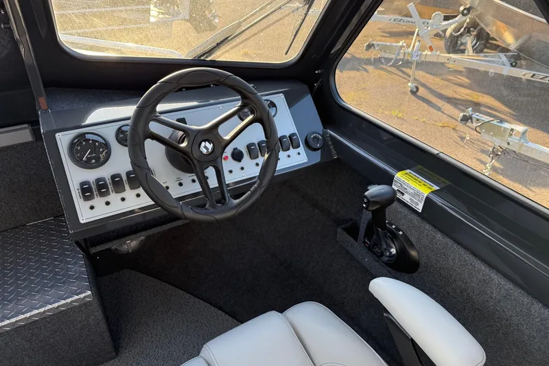 Slide: The Image of 2026 Thunder Jet 185 Luxor boat cockpit with steering wheel and control panel. - 40