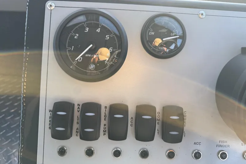 Slide: The Image of Control panel of 2026 Thunder Jet 185 Luxor boat with gauges and switches. - 47