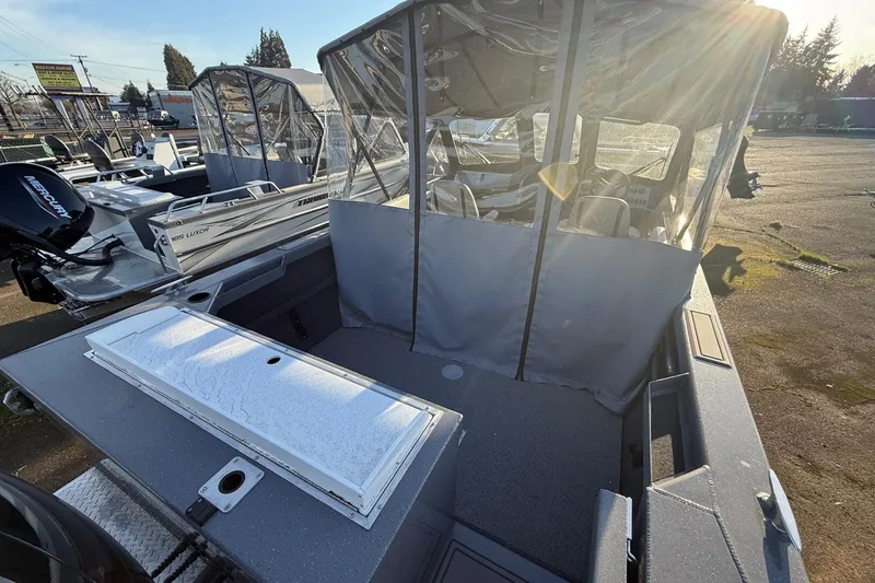 Slide: The Image of 2026 Thunder Jet 185 Luxor boat with covered seating and Mercury outboard motor. - 51