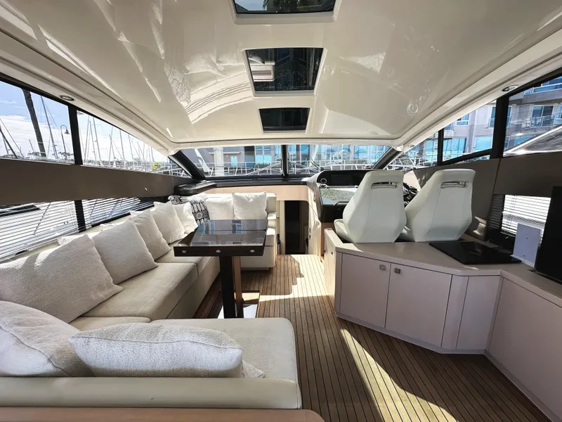 Slide: The Image of Luxurious interior of 2015 Sunseeker Predator 57 yacht with plush seating and modern design. - 14