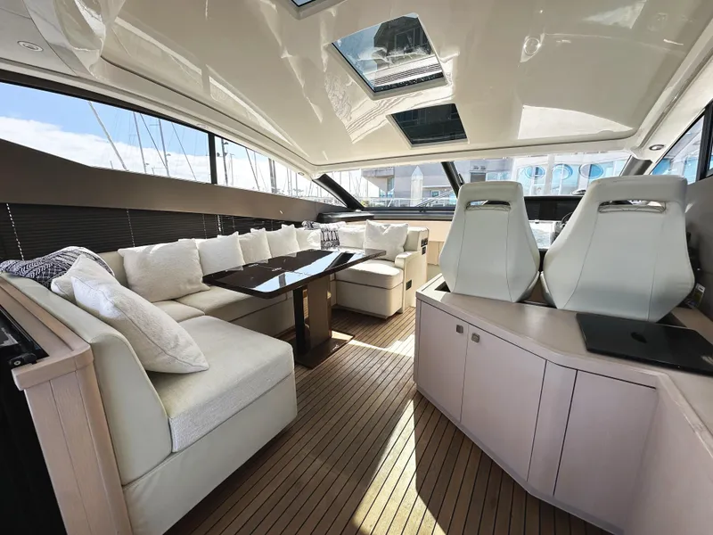 Slide: The Image of Luxurious interior of 2015 Sunseeker Predator 57 yacht with elegant seating and modern design. - 15