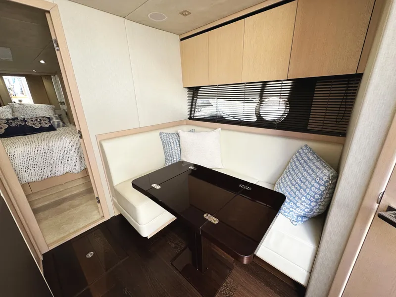 Slide: The Image of Luxurious interior of 2015 Sunseeker Predator 57 yacht with elegant seating and table. - 30