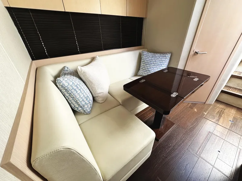 Slide: The Image of Luxurious interior of 2015 Sunseeker Predator 57 yacht with elegant seating and table. - 31